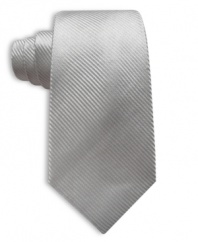 Simple and classic, you can never go wrong with a solid Perry Ellis silk tie.