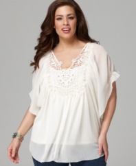 Enjoy your winter escape with Style&co.'s short sleeve plus size peasant top, accented by a crocheted bib.
