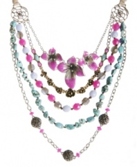 A wearable veil inspired by nature. Lucky Brand's exotic five row necklace combines pink enamel orchids with semi-precious reconstituted calcite turquoise, colorful plastic beads and flower charms. Set in mixed metal with a natural-colored leather tie. Approximate length: 46 inches. Approximate drop: 5 inches.