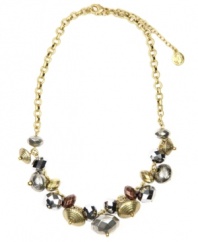 Every once in a while, it's good to shake things up. Jones New York's shimmery cluster necklace features a frontal design crafted from silver and gold tone plastic and mixed metal beads. Approximate length: 17 inches + 3-inch extender.