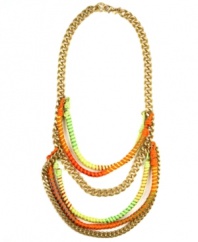 Flaunt it, fab fashionista. This not-so-subtle frontal necklace by RACHEL Rachel Roy boasts brilliant orange and multicolored threads mixed with chains in gold-plated mixed metal. Approximate length: 17 inches. Approximate drop: 2 inches.