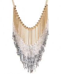 Fabulous fringe! Chic chains and ombre silver tone beading stand out on this stunning statement necklace from Kenneth Cole New York. Further embellished with sparkling crystals, it's crafted in gold tone mixed metal. Approximate length: 17 inches + 3-inch extender. Approximate drop: 4-1/2 inches.