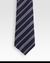 Classic tie woven with diagonal stripes in Italian silk.About 2.8 wideSilkDry cleanMade in Italy