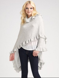 Feminine ruffles trace the edges of soft cashmere. 72 X 55 ¾ X 48 without ruffle Dry clean or hand wash Imported
