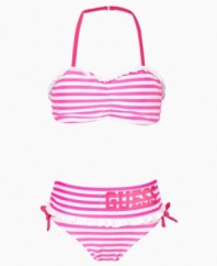 She'll be a striped standout in this sweet halter bikini from Guess.