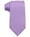 Simple and easy. This Sean John tie is a modern upgrade for your favorite dress outfit.