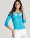 Emblazoned by a bold hue, this kate spade new york cardigan is a standout match for white summer staples. Bold beads along the neckline add whimsical flair.