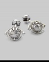 Global style for the sophisticated traveler in polished sterling silver with rotating globe detail. T-backing About 1 diam. Imported 