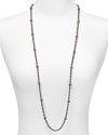 Finish off every look with this elegant rounded chain necklace crafted in shiny silver tone and finished with delicate stations. From Lauren by Ralph Lauren.