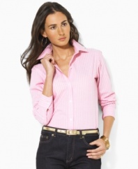Slim stripes lend classic appeal to the timeless petite Lauren by Ralph Lauren Aaron shirt, rendered in smooth wrinkle-resistant cotton for easy style.
