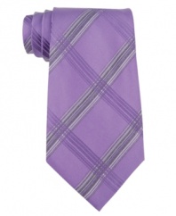 A big bold plaid tie from Calvin Klein makes an instant statement in your dress wardrobe.