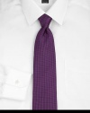An intricate pindot pattern woven with premiere silk luxury. Silk; dry clean Made in USA 