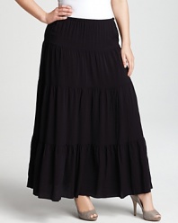 Make an entrance in this MICHAEL Michael Kors maxi that flaunts tiered layers of fabric for a billowy silhouette. Pair with colorful tunic for the ultimate in boho-chic.