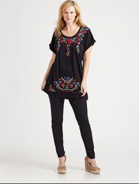 Gorgeous embroidery makes this tee stand out from the rest. Its elongated silhouette will be perfectly flattering for your figure.ScoopneckDolman sleevesAbout 33 from shoulder to hemCottonMachine washImported