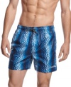 Reflect on it. You'll have no problem taking it all in as you relax in these patterned swim trunks from Calvin Klein.