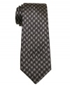 With a natty throwback pattern, this wool houndstooth skinny tie from Bar III is instantly dapper.