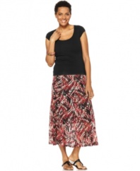 Channel island-chic style in this JM Collection skirt, featuring an on-trend midi length and chic abstract print. Try pairing it with a scoopneck tee and sandals!