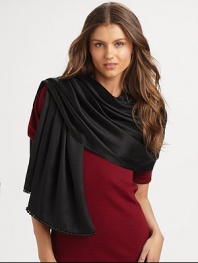 Hand-woven and hand-dyed cashmere/silk wrap reverses from a matte to a shine. Woven satin ball fringe 78L X 22W Imported