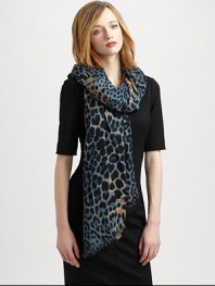 Fashion goes wild on this elegant, edgy wool and cashmere-blend scarf with an eye-catching leopard print.70% wool/30% cashmereAbout 55 X 70Dry cleanMade in Italy
