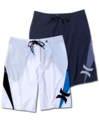 Dig up some warm-weather fun in these comfortable, color-blocked board shorts from Hurley.