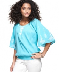Style&co.'s petite top features peasant-style inspiration in its silhouette with a few twists, like the crinkled texture and flowing bell sleeves. (Clearance)