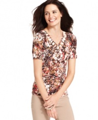 An elegantly beaded neckline and sweet floral print make this petite top from JM Collection a hit! Pair with your favorite trousers for an alluring work look.