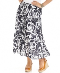 Take your look to great lengths this season with J Jones New York's plus size maxi skirt, featuring a bold floral-print.