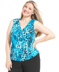 A brightly printed sleeveless top is a stylish suiting solution. Calvin Klein's plus size layer is extra flattering with a cowl neckline and easy fit.