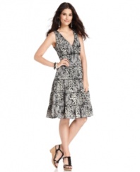 Style&co. combines animal and floral prints into a lovely petite dress! Ruffled tiers add feminine flair.