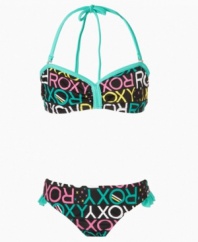 Beach party. She will bring the fun to any event in this cute, ruffly two piece bathing suit from Roxy.