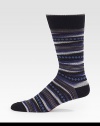 Handsome, woven dress socks printed to perfection in a brightly colored cotton blend.Mid-calf height64% cotton/35% nylon/1% lycraMachine washImported