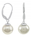 From the island of Mallorca, Spain, these drop earrings feature white round organic man-made pearl (10 mm) set in sterling silver. Approximate drop: 1 inch.