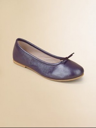 A classic ballet flat is given a stylish update in plush, pearlized leather.Slip-on style with adjustable tie at vampLeather upperCotton liningLeather/rubber solePadded insoleImported