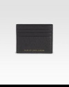 Textured calfskin leather with embossed logo detail.Four card slotsLeather4W x 3½HImported
