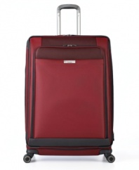 Travel on the luxurious side. Styled sleek and built smart, this expandable upright glides on four 360º spinners that follow every twist and turn of travel. The graceful curves of the exterior hit to the sophistication of the fully-stocked & fully-lined interior, which features restraining straps, suiter, pockets and more.