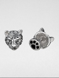 Wild about style, these antiqued sterling silver cuff links are crafted in a tiger's head and paw design.Sterling silverPaw-shaped backAbout .67 diam.Made in USA