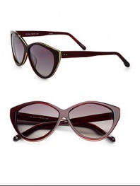 These retro-inspired resin frames are embellished in contrasting metal. Available in translucent burgundy with smoke gradient lens. 100% UV protectionImported