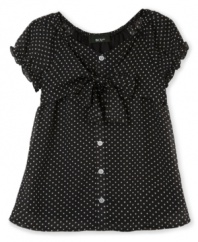 On the spot. The sweet polka dots on this breezy top from BCX will put her right in the center of her own style spotlight.