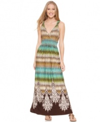 Spense's petite maxi dress silhouette is emphasized by its contouring smocked waistline and vibrant mixed prints.