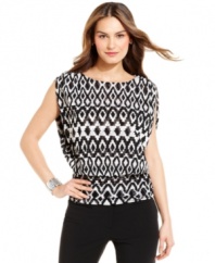 A digitized tribal print gives this chic petite top from Alfani its contemporary appeal. Sophisticated accessories keep it pretty and polished for work.