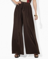Lauren by Ralph Lauren's petite wide-leg pants are crafted with a soft sueded crepe construction and finished with a comfortable smocked waistband for ease and style.