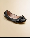 Elegantly simple slip-on flats in velvety soft leather with a big soft bow in front.Slip-onLeather and patent leather upperLeather liningRubber solePadded insoleImported