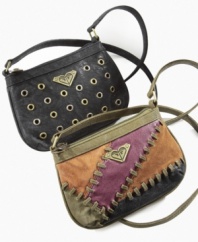 Cute carryall. She can keep her valuables tucked safely away in style with this cute faux-leather crossbody bag from Roxy.