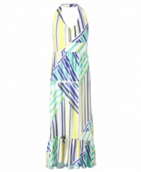 Style to the max. She'll make the best of the sunny summer in the bright colorful lines of this halter maxi dress from DKNY.