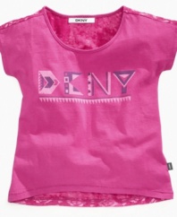 She'll put herself in the fast lane to fun fashion with the modern design of this t-shirt from DKNY.