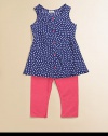 Pretty little polka dots and contrasting buttons add punch to a charming, flared tunic, paired with soft leggings.Round necklineSleevelessPullover styleFlared hemElastic waist47% pima cotton/47% modal/6% spandexMachine washImported