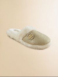 Slip into something glamorous and comfy, with a metallic knit front trimmed in fluffy faux shearling.Metallic knit upperFaux shearling trimSparkle signsture charm accentFaux shearling liningPadded insoleRubber composite soleImported