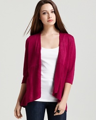 A refreshing dash of color for your everyday wardrobe, this Eileen Fisher Petites cardigan pairs a delicious hue with delicate ruffles for the perfect feminine touch.