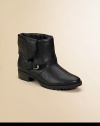 Foldover-cuff leather boots tough enough to withstand the worst in cycle-chic style.Foldover cuff snaps in backBuckled ankle strapsPebbled leather upperFabric liningMolded lug soleSturdy stacked heelImportedAdditional InformationKid's Shoe Size Guide (European Equivalent) 