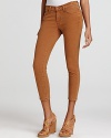 An ultra-cropped silhouette lends a retro feel to these 7 For All Mankind skinny jeans, rendered in an earthy hue.